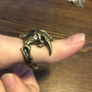 Brass sabertooth tiger skull ring